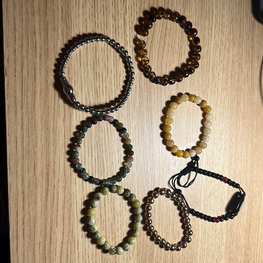 A bundle of crystal bracelets.